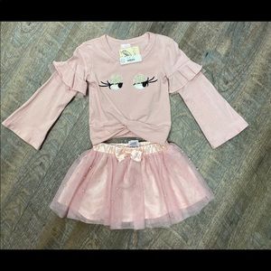 pink shirt and skirt with pearls Cala lily brand